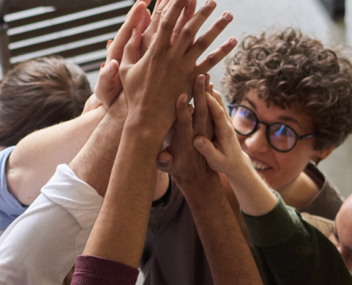 Hands together people, mentoring. Youth mentoring.